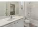 Clean bathroom with white vanity and bathtub at 7453 Vital Ct, Las Vegas, NV 89149