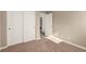 Bedroom with sliding doors and laundry access at 7453 Vital Ct, Las Vegas, NV 89149