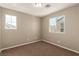 Simple bedroom with neutral decor and carpet at 7453 Vital Ct, Las Vegas, NV 89149