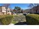 Landscaped green area with walkways at 7453 Vital Ct, Las Vegas, NV 89149