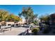 Community gathering place with benches under a tree at 7453 Vital Ct, Las Vegas, NV 89149