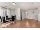 Dining room with a round table and six black chairs at 7453 Vital Ct, Las Vegas, NV 89149