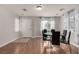 Dining room with round table and six black chairs at 7453 Vital Ct, Las Vegas, NV 89149