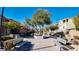 Relax in the community park with benches arranged around a central tree, offering a serene and inviting outdoor space at 7453 Vital Ct, Las Vegas, NV 89149