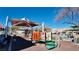 A well-equipped playground with various play structures and a sunshade cover. Outdoor activities at 7453 Vital Ct, Las Vegas, NV 89149