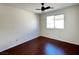 Bright bedroom featuring hardwood floors and a window at 938 Cantabria Heights Ave, Las Vegas, NV 89183