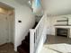 Interior view of a staircase with hardwood treads and white railing at 938 Cantabria Heights Ave, Las Vegas, NV 89183