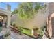 Landscaped backyard with sitting bench at 939 Paisley St, Las Vegas, NV 89145