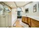 Main bathroom with dual vanities and a separate shower and tub at 939 Paisley St, Las Vegas, NV 89145