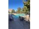 Inviting community pool with lounge chairs at 939 Paisley St, Las Vegas, NV 89145