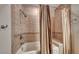 Bathroom with tiled shower/tub combo and built-in seating at , Las Vegas, NV 89123