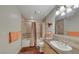 Clean bathroom with tiled shower and bathtub at , Las Vegas, NV 89123