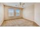 Bright bedroom with neutral walls and carpet flooring at 10161 Kermode Ct, Las Vegas, NV 89178