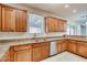 Kitchen features granite countertops and ample cabinet space at 10161 Kermode Ct, Las Vegas, NV 89178