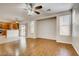 Living room with wood flooring and access to the kitchen at 10161 Kermode Ct, Las Vegas, NV 89178