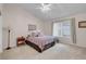 Relaxing bedroom with plush bedding and large window at 1020 Blue Lantern Dr, Henderson, NV 89015