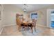 Formal dining room with wood table and chairs, and a chandelier at 1020 Blue Lantern Dr, Henderson, NV 89015