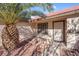 Front entry with decorative door and sidelight at 1020 Blue Lantern Dr, Henderson, NV 89015