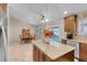 Eat-in kitchen with island, stainless steel appliances, and adjacent dining area at 1020 Blue Lantern Dr, Henderson, NV 89015