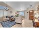 Spacious living room with neutral decor and hardwood floors at 1020 Blue Lantern Dr, Henderson, NV 89015