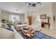 Bright living room with comfortable seating and large windows at 1020 Blue Lantern Dr, Henderson, NV 89015