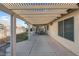 Covered patio with pergola offering shade and relaxation at 1020 Blue Lantern Dr, Henderson, NV 89015