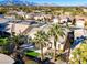 Aerial view showing house, palm trees, and neighborhood at 10247 Santo Nina Ct, Las Vegas, NV 89135