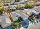 Aerial view of single-story house with tile roof and driveway at 10247 Santo Nina Ct, Las Vegas, NV 89135