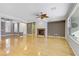 Bright living room with hardwood floors and a fireplace at 10247 Santo Nina Ct, Las Vegas, NV 89135