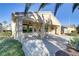 Covered patio with ceiling fans and access to the backyard at 10247 Santo Nina Ct, Las Vegas, NV 89135