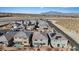 Aerial view of houses with solar panels and neighborhood at 10409 Mont Pourri Ct, Las Vegas, NV 89149