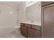 Bathroom with single vanity, bathtub, and tile flooring at 10409 Mont Pourri Ct, Las Vegas, NV 89149