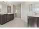 Large bathroom with double vanity and a walk-in shower at 10409 Mont Pourri Ct, Las Vegas, NV 89149