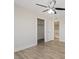 Bright bedroom with hardwood floors and ceiling fan at 10409 Mont Pourri Ct, Las Vegas, NV 89149