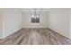 Simple dining room with hardwood floors and a window at 10409 Mont Pourri Ct, Las Vegas, NV 89149