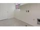 Laundry room with tile flooring, shelving, and built-in utilities at 10409 Mont Pourri Ct, Las Vegas, NV 89149