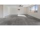 Large living room with grey carpet and lots of natural light at 10409 Mont Pourri Ct, Las Vegas, NV 89149