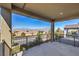 Covered balcony overlooking scenic mountain views and neighborhood at 10640 Skye Scout Ave, Las Vegas, NV 89166