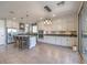 Modern kitchen with white cabinets, large island, and stainless steel appliances at 10640 Skye Scout Ave, Las Vegas, NV 89166