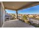 Covered patio with scenic views of the neighborhood and surrounding mountains at 10640 Skye Scout Ave, Las Vegas, NV 89166