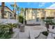 Outdoor kitchen and patio with sitting area at 10779 Crown Ct, Las Vegas, NV 89141