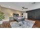 Main bedroom with dark accent wall and walk-in closet at 10779 Crown Ct, Las Vegas, NV 89141