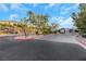 Gated community entrance with paved road at 10779 Crown Ct, Las Vegas, NV 89141