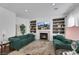 Cozy living room with fireplace and built-in shelving at 10779 Crown Ct, Las Vegas, NV 89141