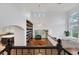 Bright living room with high ceilings and built-in shelving at 10779 Crown Ct, Las Vegas, NV 89141