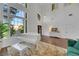 Bright living room with high ceilings, hardwood floors, and a grand piano at 10779 Crown Ct, Las Vegas, NV 89141