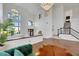 Bright living room with hardwood floors and large windows at 10779 Crown Ct, Las Vegas, NV 89141