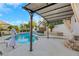 Resort-style pool with spa and covered patio at 10779 Crown Ct, Las Vegas, NV 89141