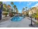 Resort-style pool and spa surrounded by a spacious patio at 10779 Crown Ct, Las Vegas, NV 89141