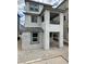 Stunning two-story home showcasing stucco exterior, modern windows, and a covered balcony at 1521 Bat Hawk St, Las Vegas, NV 89138